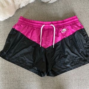 Nike athletic shorts. Black and Pink.